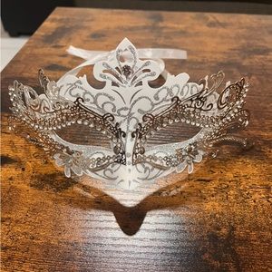 Decadent silver and white masquerade ball mask